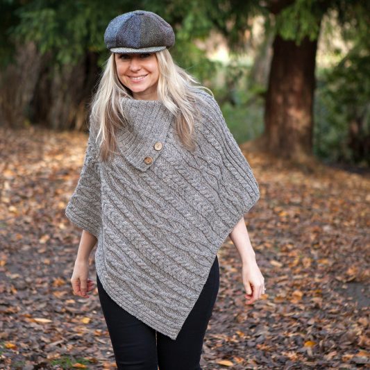 Grey British wool ladies Aran poncho on female model