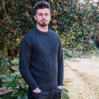 Man in charcoal coloured wool sweater