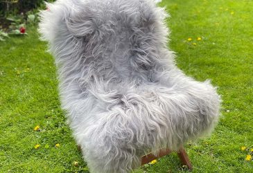 Silver icelandic sheepskin rug on a chair