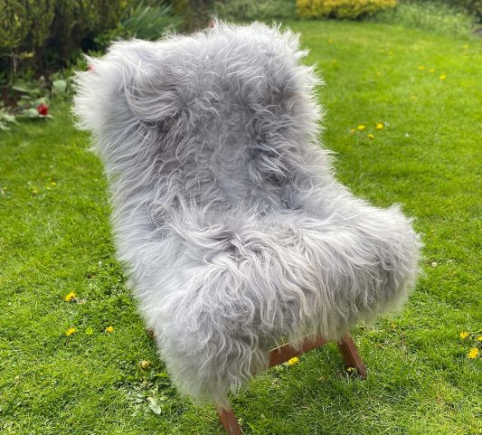 Silver icelandic sheepskin rug on a chair