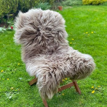 Taupe brown icelandic sheepskin rug on a chair