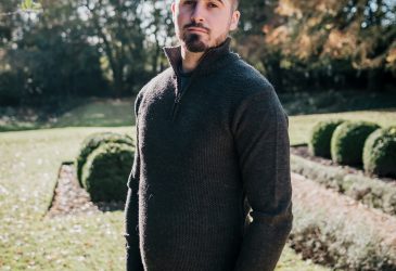 Green zip neck wool jumper on model