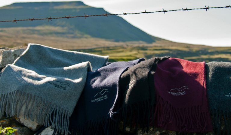 Glencroft 3 peaks scarves in front of Ingleborough mountain
