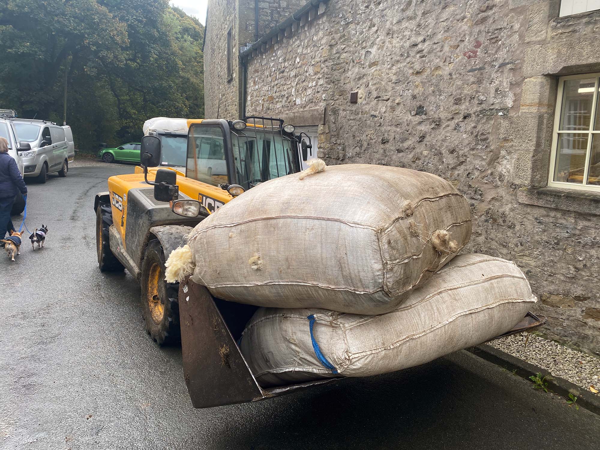Wool sheets on JCB bucket